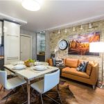 Brown leather sofa in the kitchen